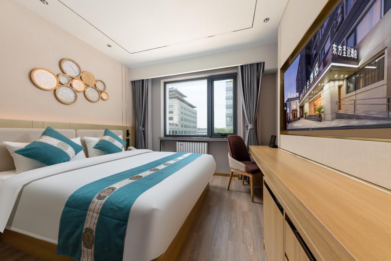 East Sacred Hotel: Tiananmen Square Proximity with Tourism Services Beijing Exterior photo A room at the hotel